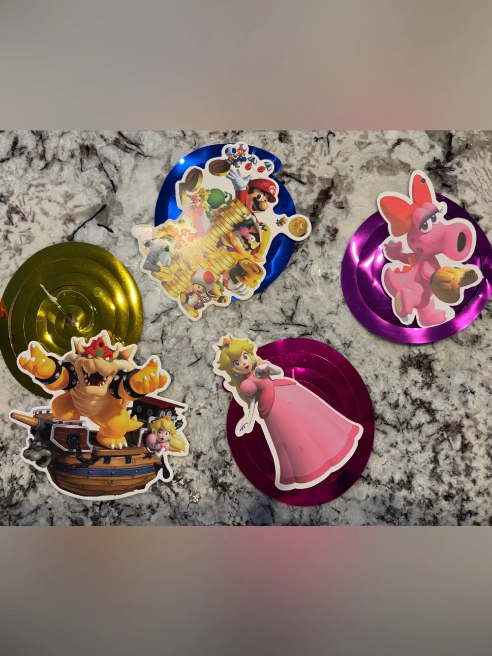 Assorted Super Mario Galaxy birthday decorations